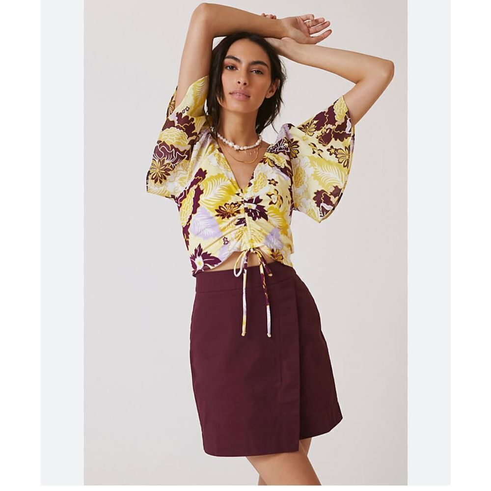 Maeve Anthropologie cinched yellow floral flutter sleeve tie top